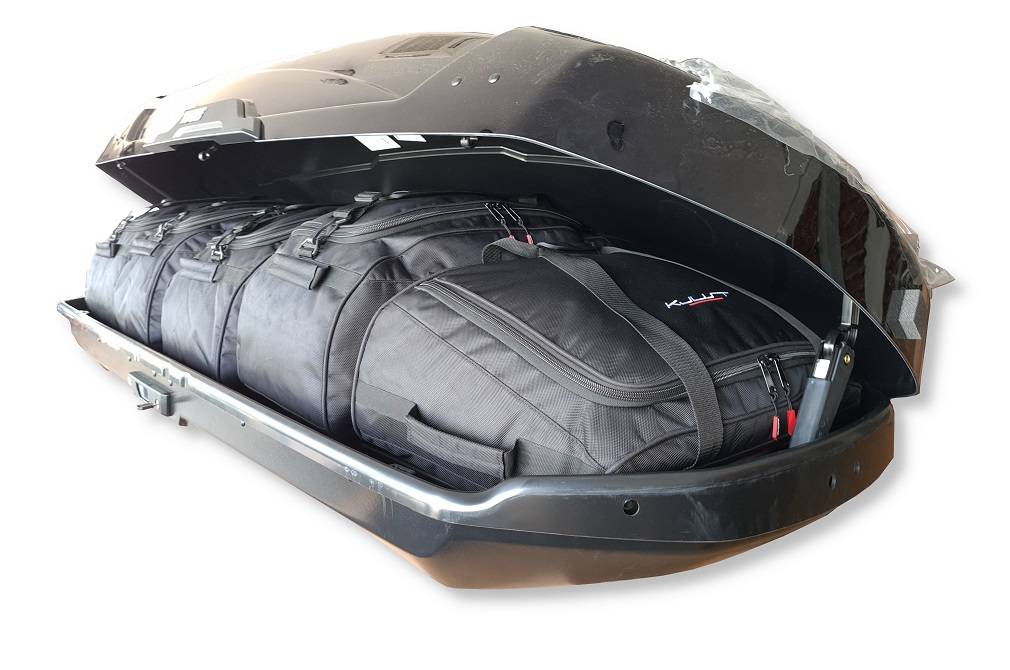 Kjust Taschenset in der Thule Motion XT XL Dachbox