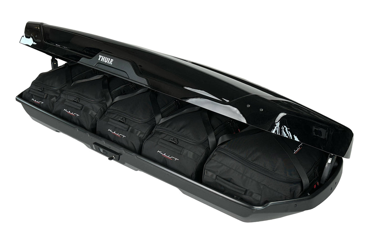 Kjust Taschenset in der Thule Motion XT Alpine Dachbox