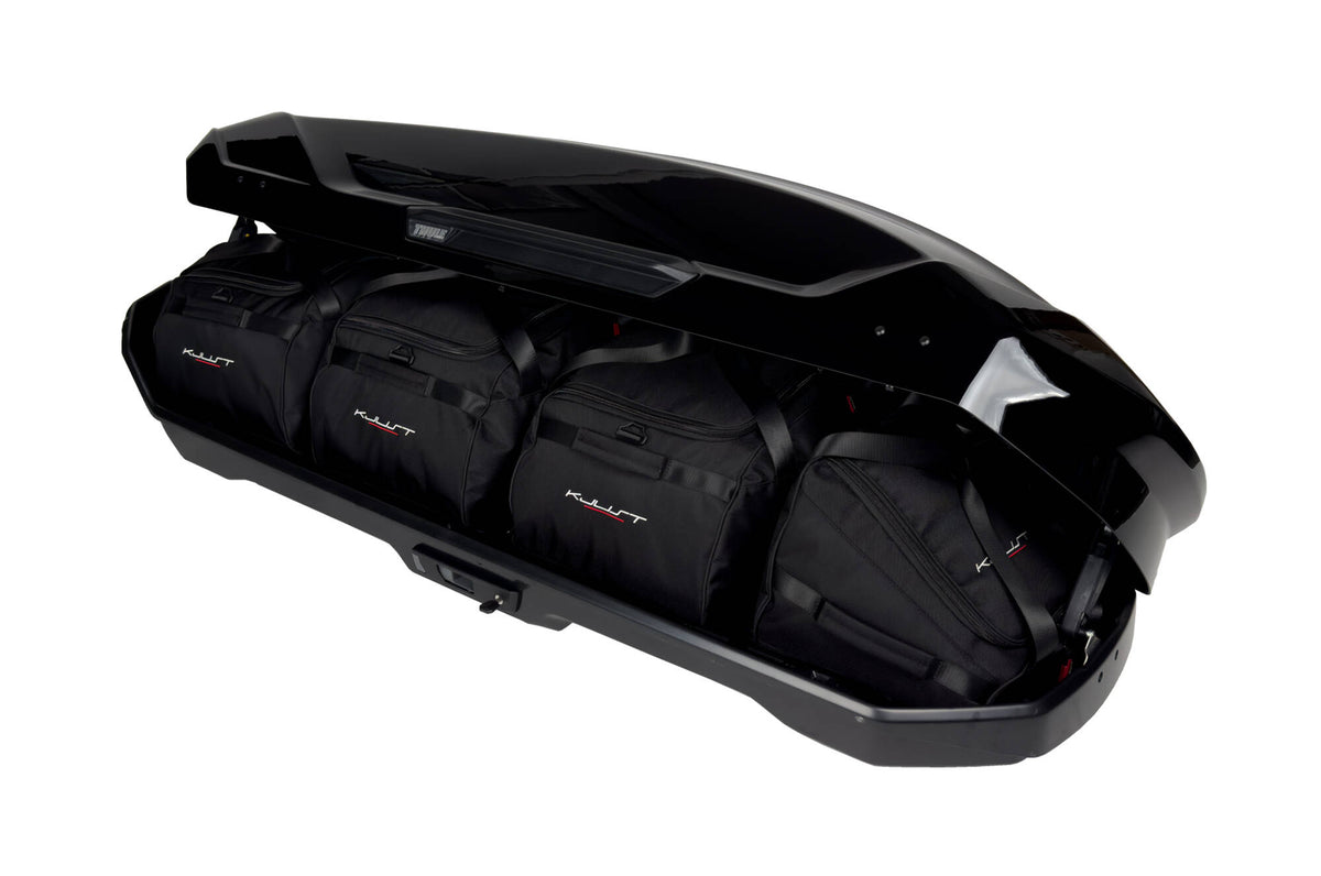 Kjust Taschenset in der Thule Motion 3 Sport Dachbox