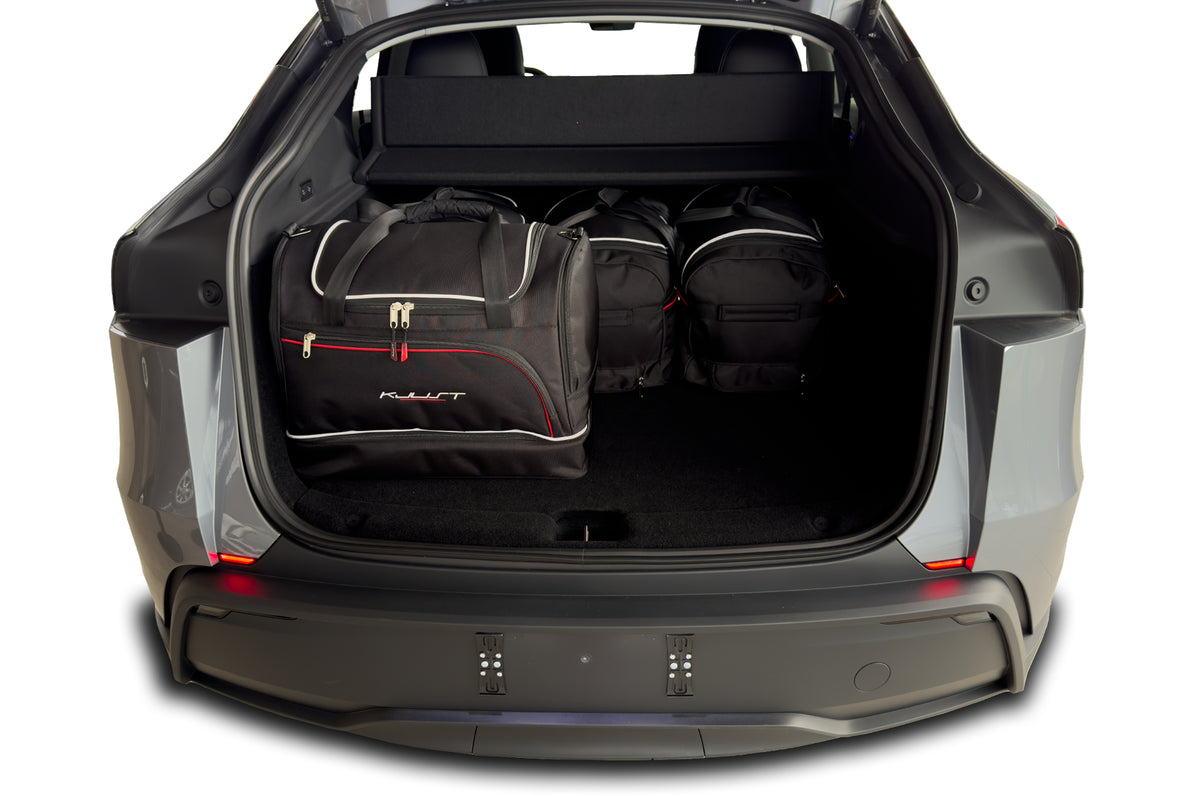 Kjust Kofferraumtaschen im Kofferraum des Tesla Model Y Juniper